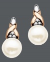 Dress up a cocktail dress or a business suit with these elegant stud earrings. 14k rose gold and sterling silver add versatility to a cultured freshwater pearl drop (6 mm) and sparkling diamond accents. Approximate drop: 1/2 inch.