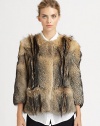 Luxurious fox fur, tailored with chic, cropped sleeves and supple leather trim.Natural fox fur collarThree-quarter sleevesHook-and-eye closurePatch pocketsAbout 24 from shoulder to hemShell: Natural fox furLining: PolyesterDry clean by a fur specialistImportedFur origin: America