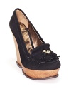 Silver-tipped tassels and a jaunty kilty fringe top these towering wedges--a chic take on classic collegiate style. By Sam Edelman.