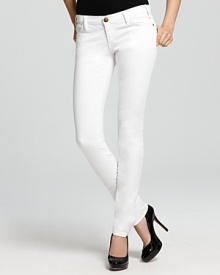 Work the white trend all year long in these Current/Elliott jeans, cut in a skinny silhouette for a sleek, streamlined look. Work the white trend all year long in these Current/Elliott jeans, cut in a skinny silhouette for a sleek, streamlined look.