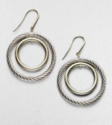 From the Thoroughbred Collection. Gracefully graduated circles, one of cabled sterling silver, one of 18k gold. Sterling silver and 18k yellow gold Drop, about 1½ Diameter, about 1 Ear wire