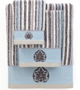 Sweet serenity. Offering a romantic and elegant composition for your bath space, this Aquarelle Embroidery hand towel features beautiful stripes in soft blue hues. Embellished with subtle embroidery along the hem.