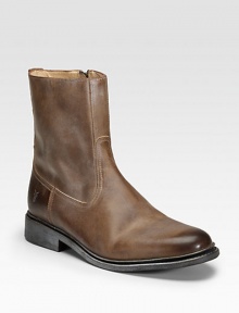 Classic construction and a timeless profile in casual leather with a hidden zipper for easier on and off. Inside zip closure Shaft, 8 Leather lining Padded insole Leather sole Imported Classic construction and a timeless profile in casual leather with a hidden zipper for easier on and off. Inside zip closure Shaft, 8 Leather lining Padded insole Leather sole Imported
