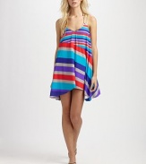 Golden trim and a soft, ruffle hem give this striped design a romantic look. V-neckSleevelessRacerbackPull-on style82% nylon/18% spandexHand washImported