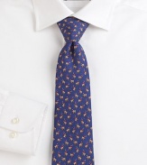 A handsome yet sporty printed design of colorful horses and jockeys woven in fine Italian silk.SilkDry cleanMade in Italy