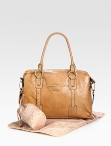 Crafted of rich cowhide, no one need know that this stunning bag is thoughtfully designed to hold baby essentials.Double top handles, about 10 dropRemovable, adjustable webbed shoulder strap, 11-22 dropTop zip closeTwo outside open pocketsStud detail and brushed hardwareInside open and zip pocketsIncludes changing pad and insulated bottle caseInside clip-on case for phone, keys Crafted of rich cowhide, no one need know that this stunning bag is thoughtfully designed to hold baby essentials.Double top handles, about 10 dropRemovable, adjustable webbed shoulder strap, 11-22 dropTop zip closeTwo outside open pocketsStud detail and brushed hardwareInside open and zip pocketsIncludes changing pad and insulated bottle caseInside clip-on case for phone, keys