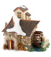 The door at Brandon Mill is always open for service. Crafted of hand-painted porcelain, this miller's cottage brings heartwarming tradition to your Dickens' Village from Department 56.