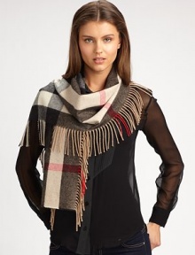 A soft, cashmere design in a mega check pattern accented with a fringe border. CashmereAbout 71 X 20Dry cleanImported A soft, cashmere design in a mega check pattern accented with a fringe border. CashmereAbout 71 X 20Dry cleanImported