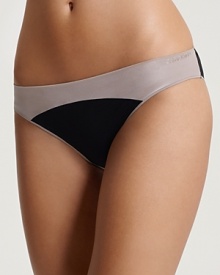 Add a modern accent to your intimates collection with this colorblock bikini from Calvin Klein.