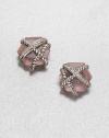 From the Cable Wrap Collection. An pretty, hexagon-shaped rose quartz stone wrapped in sterling silver cables and dazzling diamonds. Rose quartzDiamonds, .07 tcwSterling silverSize, about .39Post backImported 