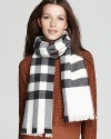 More of a soft thing, Burberry's classic check print scarf is oversized and rendered in a luxe wool-cashmere blend.