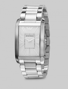 A sleek design with a mastery of the everyday in stainless steel with a curved bracelet. Rectangle bezel Quartz movement Water resistant to 5 ATM Second hand Stainless steel case: 31mm (1.22) Stainless steel bracelet: 23mm (0.90) Deployment clasp Imported 