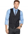 Add a dressy topnote to your look with this dapper slim-fit vest from Alfani Red.