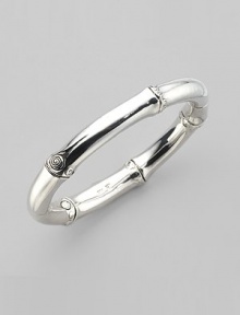 From the Bamboo Collection. The unique look of bamboo, recreated in a stuningsterling silver bangle. This design was expressly created to support an afforestation project on Nusa Penida, an arid island off the coast of Bali. For every purchase, John Hardy will donate a portion of the retail price to the cost of planting bamboo. This bangle helped plant 16 bamboo seedlings. Sterling silver Diameter, about 2½ Width, about ¼ Hinged with push-lock clasp Made in Bali From the Bamboo Collection. The unique look of bamboo, recreated in a stuningsterling silver bangle. This design was expressly created to support an afforestation project on Nusa Penida, an arid island off the coast of Bali. For every purchase, John Hardy will donate a portion of the retail price to the cost of planting bamboo. This bangle helped plant 16 bamboo seedlings. Sterling silver Diameter, about 2½ Width, about ¼ Hinged with push-lock clasp Made in Bali