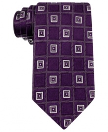 A punchy pattern makes a power statement on this silk tie from Donald J. Trump. A punchy pattern makes a power statement on this silk tie from Donald J. Trump.