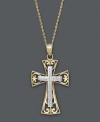 Cherish your faith in extraordinary design. This intricate cross pendant features an ornate, filigree pattern in 14k gold and 14k white gold. Approximate length: 18 inches. Approximate drop width: 1/2 inch. Approximate drop length: 1 inch.