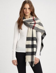 A beautiful cashmere style with an signature print and fringe details. CashmereAbout 14 X 79Dry cleanImported A beautiful cashmere style with an signature print and fringe details. CashmereAbout 14 X 79Dry cleanImported
