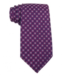 Make a distinguished statement with this outside-of-the-box patterned tie from Calvin Klein. Make a distinguished statement with this outside-of-the-box patterned tie from Calvin Klein.