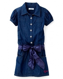 Denim goes luxe with a charming shirt dress from GUESS Kids featuring puff sleeves and a satin ribbon sash detail. Denim goes luxe with a charming shirt dress from GUESS Kids featuring puff sleeves and a satin ribbon sash detail.