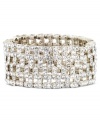 Get your glam on with this show-stopper crystal cuff from Anne Klein. The stretch design features an array of glittery, glass stones set in an intricate geometric pattern. Set in silver tone mixed metal. Stretches to fit wrist. Approximate diameter: 2-1/4 inches