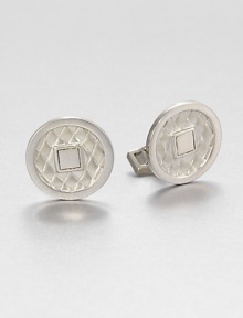 From the Naga Collection. Evoking the look of an ancient coin with its squared hole, a diamond-textured disc of sterling silver forms the centerpiece of an elegant cuff link in a smooth silver setting.Sterling silverSwivel backMade in Bali From the Naga Collection. Evoking the look of an ancient coin with its squared hole, a diamond-textured disc of sterling silver forms the centerpiece of an elegant cuff link in a smooth silver setting.Sterling silverSwivel backMade in Bali