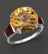 Tapered garnet baguettes create a warm glow around a 6.03 ct. t.w. citrine set in 18K white gold.