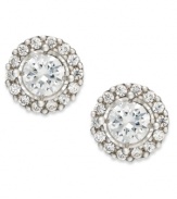 A look that's quite heavenly. True Miracle's halo stud earrings dazzle with round-cut diamonds (1/2 ct. t.w.) providing a lustrous touch. Set in 14k white gold. Approximate diameter: 1/4 inch.