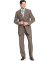 Constructed with neat, modern lines and accented with vintage sharkskin, this smart and sophisticated Michael Kors suit makes a great choice for the office or any formal occasion.