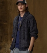 Inspired by the high seas, this knit sweater channels the look of a rugged fisherman with its loose, cozy fit and weathered detailing.