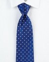 A suiting wardrobe essential handsomely rendered in luxurious, dotted silk.SilkDry cleanMade in Italy