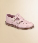 A chic T-strap design in metallic, finished with a double buckle closure and perforated teardrops on the toe for a precious look. Double buckle closure Synthetic upper Rubber sole Padded insole Leather lining ImportedPlease note: It is recommended that you order one ½ size smaller than measured. If your child measures a size 7.0, you may want to order a 6 ½. 