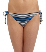 THE LOOKMultistripe printElastic waist and leg openingsLogo-embossed button at one sideSide tiesTHE MATERIAL80% nylon/20% spandexFully linedCARE & ORIGINHand washImportedPlease note: Bikini top sold separately. 