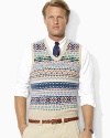 A preppy Fair Isle pattern lends handsome style to a classic V-neck sweater vest, knit in soft, smooth yarns for lightweight warmth and superior comfort.