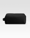 A suitcase essential for the next trip and every one to come in smooth, lasting leather. Zip closure Side handle 5H X 10½W X 5½D Imported 