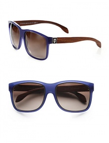 Lovely dark wood and skull plaques accent acetate frames for a warm and chic look. Available in black with grey gradient lens or blue with brown gradient lens. Logo temples100% UV protectionMade in Italy Lovely dark wood and skull plaques accent acetate frames for a warm and chic look. Available in black with grey gradient lens or blue with brown gradient lens. Logo temples100% UV protectionMade in Italy