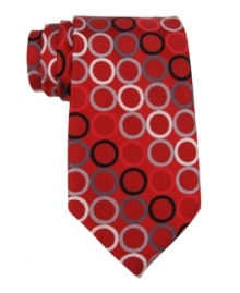 Vibrant colors and a neat geometric print make this smooth silk tie from Michael Kors a must-have for any guy's tailored wardrobe. Vibrant colors and a neat geometric print make this smooth silk tie from Michael Kors a must-have for any guy's tailored wardrobe.