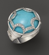 This bold turquoise dome ring, set in sterling silver, gets a dramatic finish with a white sapphire Maltese cross. By Elizabeth Showers.