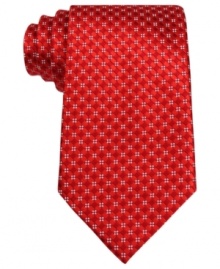 A powerful pattern and bold color pair up to mean serious business in this silk tie from Donald J. Trump. A powerful pattern and bold color pair up to mean serious business in this silk tie from Donald J. Trump.