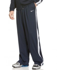 Whether for lounging around or working out, these Nike track pants have a sporty, comfortable style you'll love. Whether for lounging around or working out, these Nike track pants have a sporty, comfortable style you'll love.