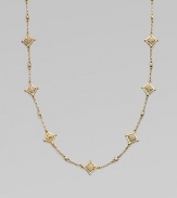 A long glamorous chain bedecked in sparkling stones.Glass Enamel 14k goldplating Chain length, about 41 Imported