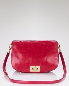 Let Tory Burch's pop-of-color messenger enliven your fall look. In a warm lipstick hue, this chicly-sized bag pairs with a heritage-inspired coat to work a coolly-hued take on preppy. Let Tory Burch's pop-of-color messenger enliven your fall look. In a warm lipstick hue, this chicly-sized bag pairs with a heritage-inspired coat to work a coolly-hued take on preppy.