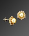 Frame your face with a golden burst of sunshine. These dazzling earrings by CRISLU feature glass champagne-colored pearls (8 mm) surrounded by sparkling cubic zirconias (4-1/5 ct. t.w.) set in gold over sterling silver.