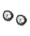 Metallic sparkle takes charge on these stud earrings from Swarovski. A clear crystal is surrounded by Crystal Silvernight chatons. Crafted in rhodium-plated mixed metal. Approximate diameter: 1/2 inch.