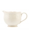 With fanciful beading and a feminine edge, this Lenox French Perle sauce pitcher is a great addition to your white dinnerware and has an irresistibly old-fashioned sensibility. Hardwearing stoneware is dishwasher safe and, in a soft white hue with antiqued trim, a graceful addition to every meal. Qualifies for Rebate