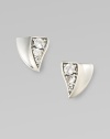 From the Thorn Collection. Triangular, thorn-shaped studs of gleaming sterling silver, with a concave profile on one side and sparkling white sapphires on the other.White sapphireSterling silverLength, about ½Post backImported