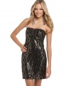 Go glam in this high-shine black & gold sequined As U Wish mini dress – perfect for dancing under a disco ball!