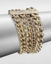 An elegant piece with link chains in various sizes gathered in a multi-row design. Antique-finished goldtoneLength, about 8Slide closureImported 