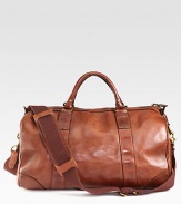 Invoking the classic feel of gentlemen's vintage sporting holdalls, an essential gym bag is crafted from sturdy leather with an embossed signature luggage tag for timeless style.Zip closureDouble top handlesAdjustable, removable shoulder strapInterior zip pocketEmbossed signature leather luggage tagLeather20W x 12H x 7DImported