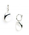 Polished and precise -- these shapely drop earrings by Nine West will add style for ages. Crafted in silver tone mixed metal, a hoop design highlights a matching oval-shaped charm. Approximate drop: 1 inch.