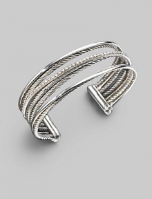 From the Silver Ice Crossover Collection. Crisscross rows of sterling silver and white gold - some smooth, some twisted, some paved with diamonds - create a shining look in this open strand cuff. Diamonds, 0.75 tcw Sterling silver & 14k white gold Cable, 3mm Diameter, about 2½ Width, about ¾ Made in USA